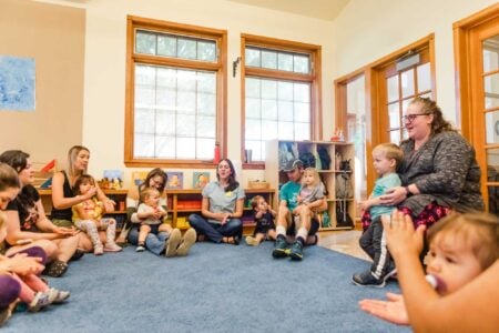 image of parents and children in a circle