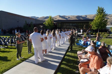 Clarkston nurses lined up for nurse pinning ceremony on the Clarkston campus.