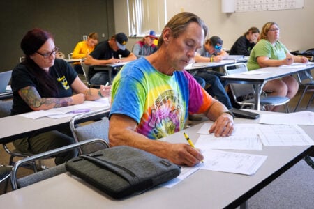 Ag business student working on assignment.