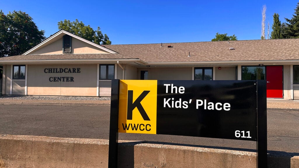 The Kid's Place building sign behind the child care building