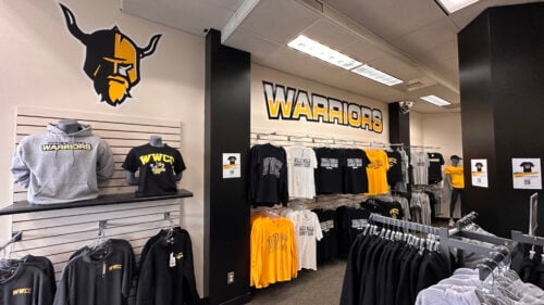 Inside the student store with WWCC clothing.