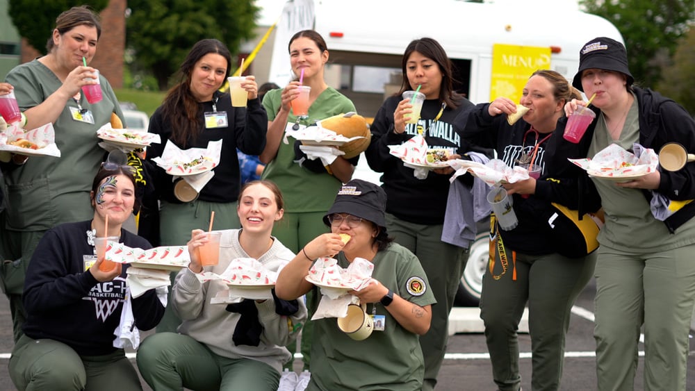 Nursing students outside eating lunch