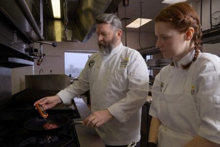 teacher and student in cooking class.