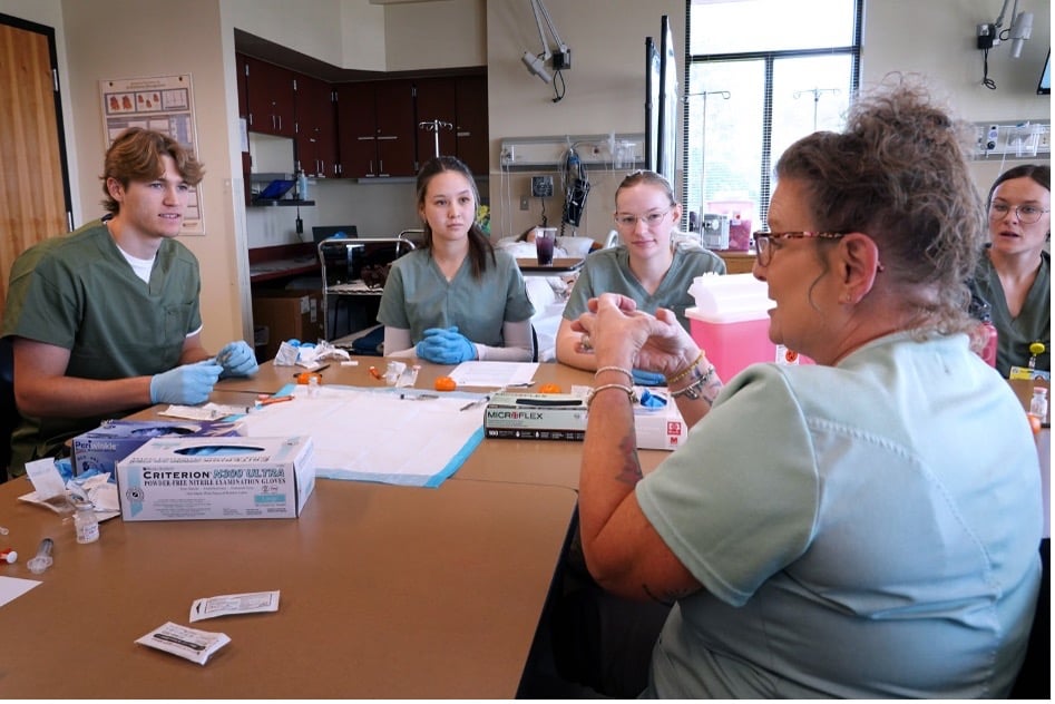nursing faculty with students